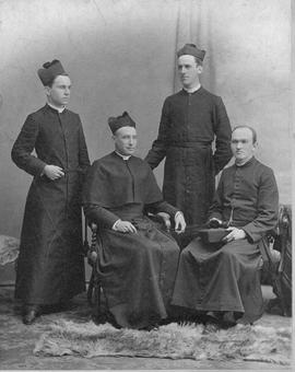 Reverend Canon J. Simpson and assistants portrait